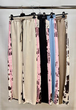 Load image into Gallery viewer, Cow print side stripe joggers
